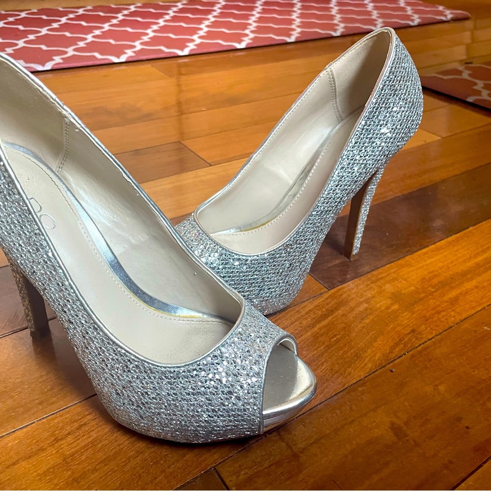 Aldo Size 7.5 sparkly silver high heel shoes